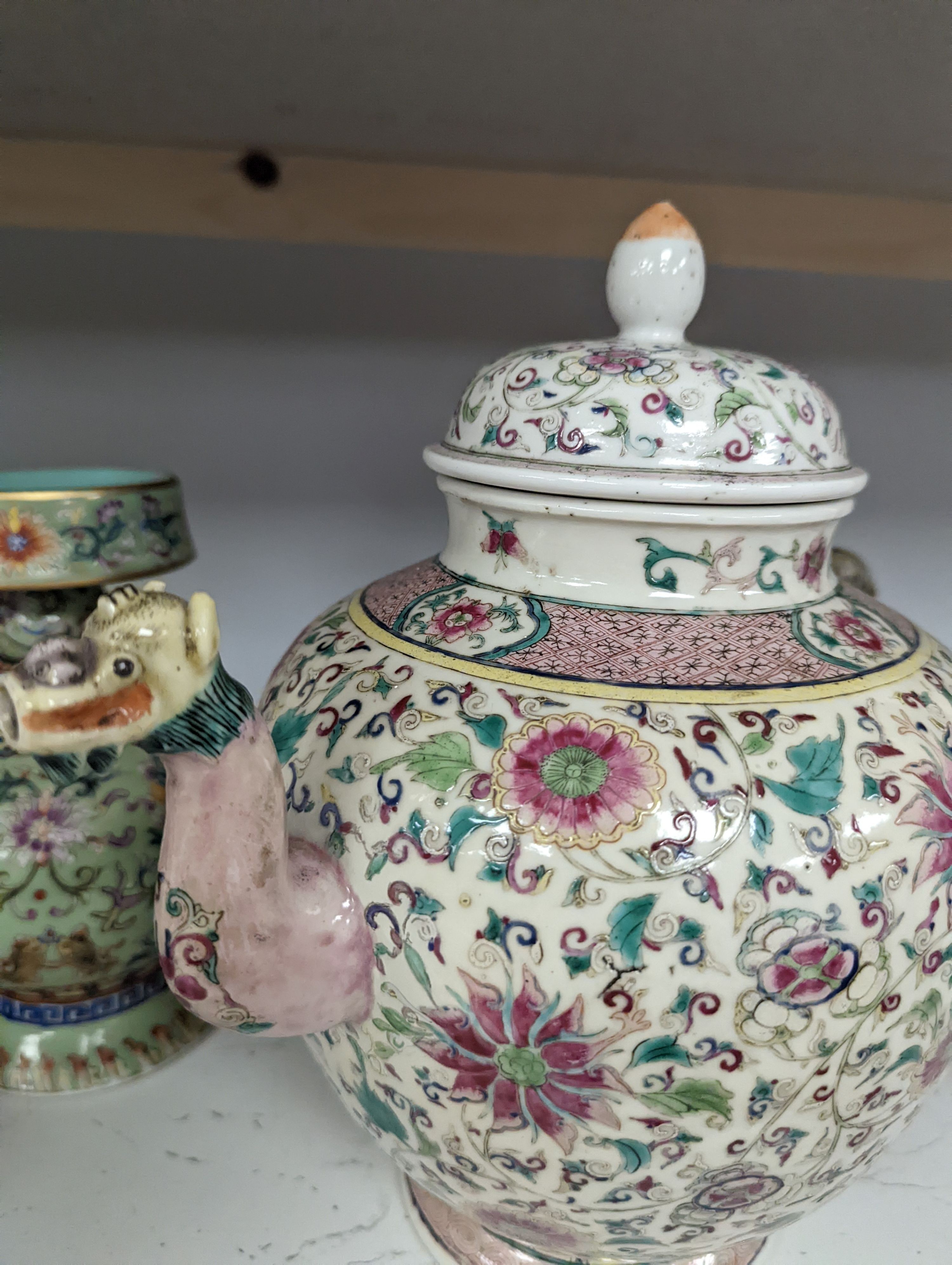 A large 19th century Chinese famille rose wine pot, and another wine pot, tallest 27cm